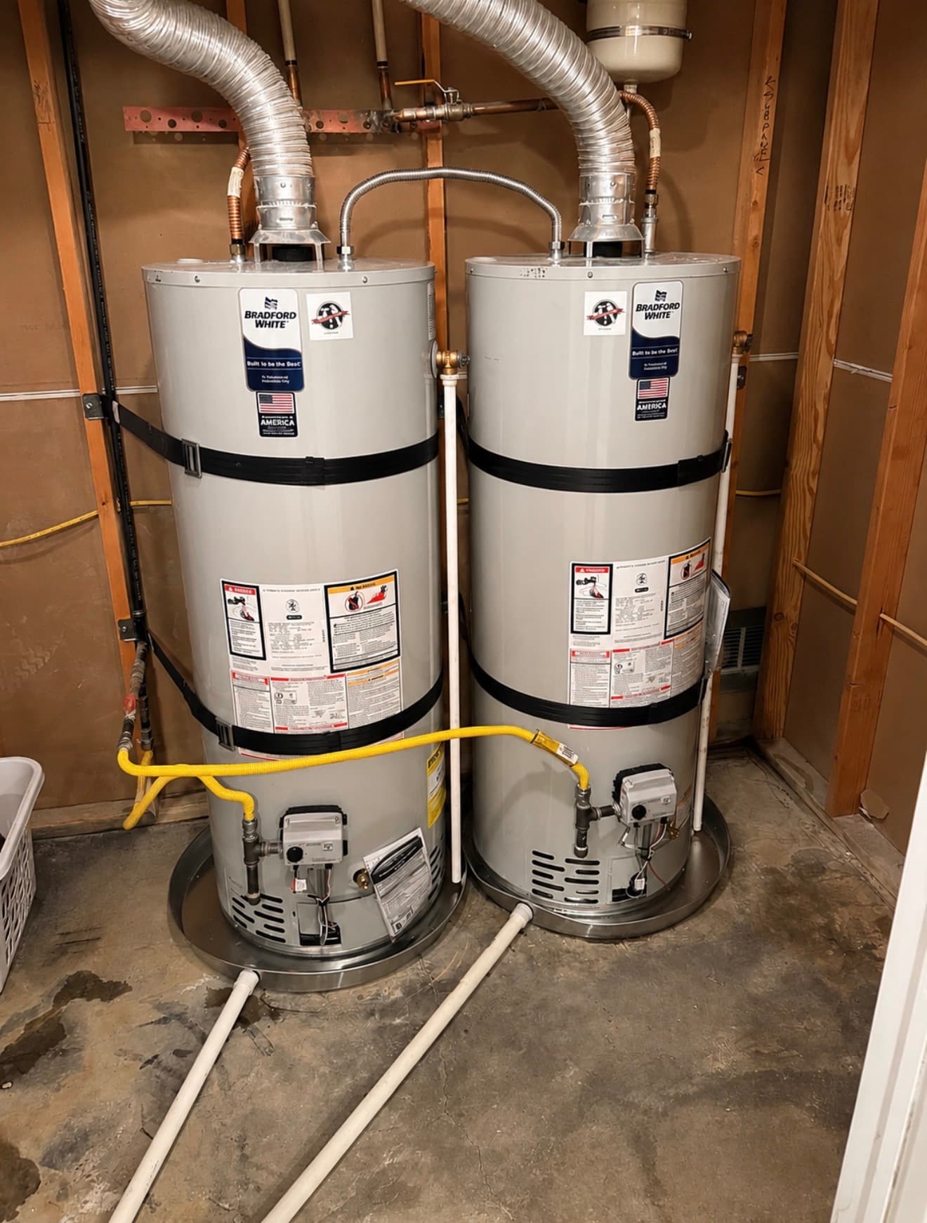 Two Bradford White gas water heaters installed side by side in a Cedar City home by Halladay Plumbing